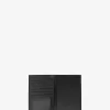 Jet Set Medium Patent Logo Debossed Passport Wallet